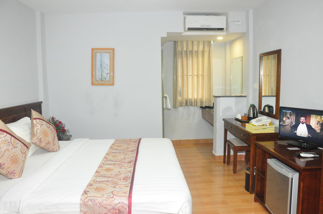 Green Leaf Hotel Yangon Extérieur photo